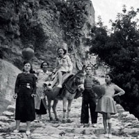 Ruta amb burro - Fotografia antiga en blanc i negre